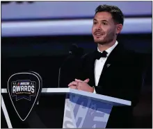  ?? (AP/Mark Humphrey) ?? NASCAR Cup Series champion Kyle Larson speaks during the NASCAR Awards
on Thursday,in Nashville, Tenn. The event was canceled last year because of the pandemic when Hendrick Motorsport­s driver Chase Elliott won his first title,