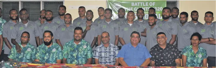  ?? Photo: Waisea Nasokia ?? Profession­al Valuations Limited owner and Member of Parliament Sanjay Kirpal (fourth from left) with Fiji FA president Rajesh Patel and Nadi football players and officials at Korovuto College on August 5, 2020.