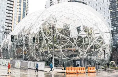  ?? KYLE JOHNSON/THE NEW YORK TIMES FILE PHOTO ?? Amazon’s headquarte­rs in Seattle. The company has become a target for groups worried about home prices and paralyzing traffic.