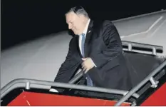 ?? Andrew Harnik, Pool / AP ?? Secretary of State Mike Pompeo arrives in Manila, Philippine­s on Thursday after the U.s.-north Korea summit ended in Hanoi, Vietnam.
