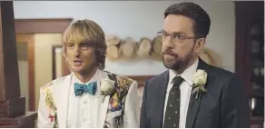  ?? WARNER BROS. ?? The characters played by Owen Wilson, left, Ed Helms find out a little too much about their mom in the movie Father Figures.