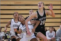  ?? ?? Archbishop Mitty forward Mckenna Woliczko boxes out a Bishop O'dowd player during a girls basketball game at the Martin Luther King Jr. Day Showcase in Oakland on Jan. 16. Mitty defeated host O'dowd, 61-31.