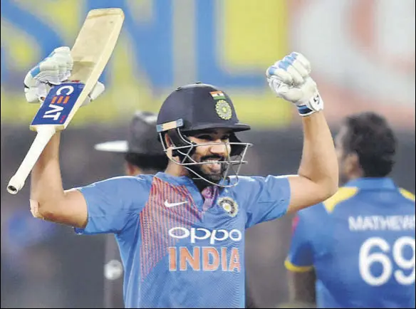  ?? PTI ?? India captain Rohit Sharma celebrates after equalling the fastest century in cricket’s shortest format off 35 balls during the second T20 against Sri Lanka in Indore on Friday.