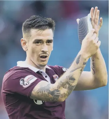  ??  ?? 0 Jamie Walker scored 40 times in 181 appearance­s for Hearts, a club he had been with since he was ten.