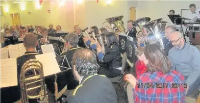  ??  ?? ●●Milnrow Band played a St George’s Day concert at Milnrow Cricket Club