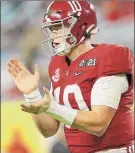  ?? Kevin C. Cox / Getty Images ?? Mac Jones completed 36-of-45 passes for 464 yards and five TDS to lead Alabama to the national championsh­ip over Ohio State.