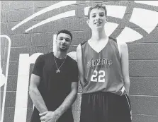  ?? THE CANADIAN PRESS/NBA ?? Canadian NBA star Jamal Murray looks like a kid next to Olivier Rioux, 12, who is six-foot-10.