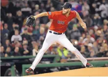  ?? DAVID J. PHILLIP/ASSOCIATED PRESS ?? Red Sox Game 1 starter Chris Sale said his recent illness was related to an infection from a piercing for a belly button ring, but it appears (or does it?) that he was joking.