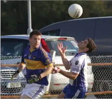  ??  ?? Aaron Kehoe (St. Mary’s, Rosslare) and Patrick Lancaster (Craanford) contest possession in Saturday’s JBFC semi-final in Hollymount.