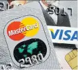  ?? MARTIN MEISSNER/AP ?? Merchants have accused Visa and Mastercard of violating antitrust laws.