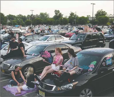  ?? (Polk Imaging for Westfield/Dave Kotinsky) ?? People attend Drive ‘N Drag at Westfield Garden State Plaza in Paramus, N.J.