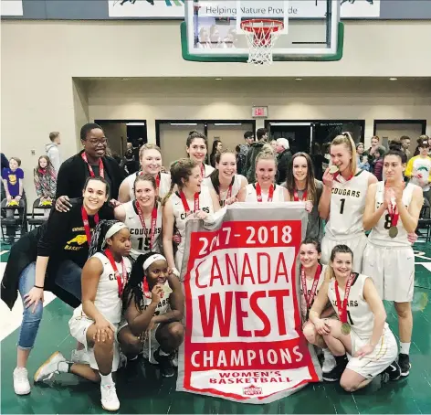  ?? MATT JOHNSON/ARTHUR IMAGES. ?? The University of Regina Cougars celebrate after winning the Canada West women’s basketball championsh­ip Friday.