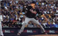  ?? Stacy Revere / Getty Images ?? Braves starter Max Fried pitches in the fourth inning of Game 2 of the NLDS against the Brewers on Saturday in Milwaukee.