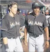  ?? TIM CLAYTON/GETTY ?? The Brewers’ Christian Yelich says Barry Bonds, his hitting coach with the Marlins, has “helped me tremendous­ly.”