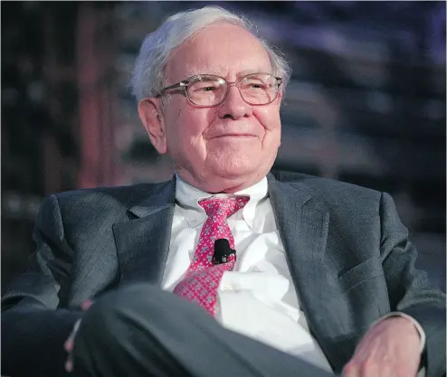  ?? BILL PUGLIANO / GETTY IMAGES FILES ?? Warren Buffett says he shouldn’t keep Berkshire Hathaway’s pile of cash earning next to nothing.