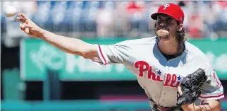  ?? ANDREW HARNIK/THE ASSOCIATED PRESS ?? Philadelph­ia Phillies starting pitcher Aaron Nola has come out of obscurity to become a viable Cy Young candidate as the top pitcher in the National League this season.