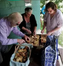  ??  ?? Above left: Morning tea of date scones and ginger cake supplement­ed the celebratio­ns.Above right: The longest standing members who walked to day. Joy Brown, Dorothy Mutton and Glenn Masters.