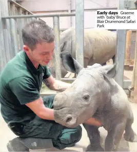  ??  ?? Early days Graeme with `baby’ Bruce at Blair Drummond Safari Park