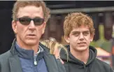 ?? KEN RUINARD/USA TODAY SPORTS ?? Arch Manning, shown with his father, Cooper Manning, is the top-rated player in the Class of 2023.
