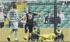  ??  ?? 0 Scott Robinson scores in the 90th minute for Livingston.