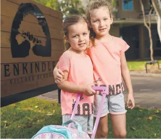  ?? Picture: EVAN MORGAN ?? DEMOCRATIC: Sisters Paige, 5, and Marly Batchelor, 7, at Enkindle Village School at James Cook University.