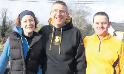  ??  ?? Members of Ashford Athletic Club Una Redmond, Damian Glynn and Derek Connolly all set to go at the club’s road race on Tighes Avenue Ashford