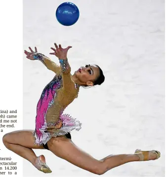  ?? — AFP ?? Fight to the last breath: Amy Kwan Dict Weng competing in the ball event of the individual all-around final at the Coomera Indoor Sports Centre yesterday.