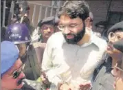  ?? AFP ?? Omar Sheikh comes out of a Karachi court. n