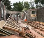  ?? KATHY ESSERY ?? THEN: The main floor, during the demolition that would leave just two of the bungalow’s original walls. An open-concept space has been created on the ground level.