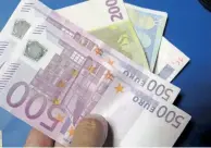  ??  ?? A recent European Central Bank survey has shown that 57 percent of Greeks are paid in cash, far more than in any other eurozone country.