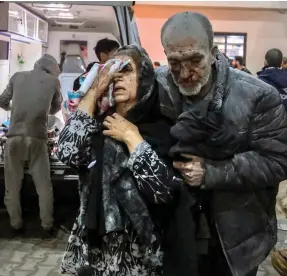  ?? ?? injured Palestinia­ns arrive for treatment at Kuwait Hospital in Rafah