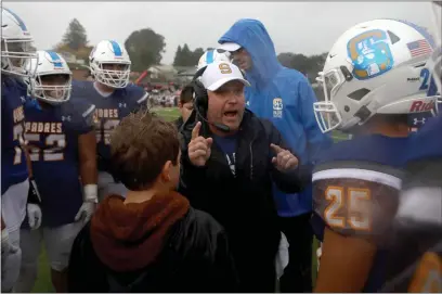  ?? ANDA CHU — BAY AREA NEWS GROUP FILE ?? Serra head coach Patrick Walsh huddles up with his players as they take on San Joaquin Memorial in the fourth quarter of a CIF Northern California Division 1-A regional championsh­ip game in San Mateo on Dec. 7, 2019.