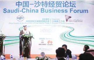  ??  ?? DEFINING PRIORITIES: Khalid Al-Falih, minister of energy, industry and mineral resources, addresses Saudi-China Business Forum in Beijing on Monday. (SPA)