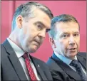  ?? CP PHOTO ?? Treasury Board President Scott Brison, right, and Nova Scotia Premier Stephen McNeil speak quietly during an announceme­nt of a bilateral agreement for more than $828 million over the next decade for infrastruc­ture projects in Nova Scotia in Halifax on...