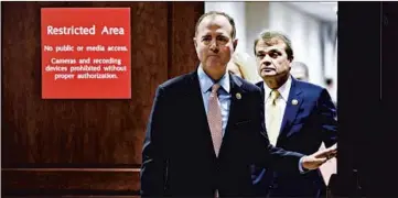  ?? SUSAN WALSH/AP ?? House Intelligen­ce Committee Chairman Adam Schiff, D-Calif., followed by Rep. Mike Quigley, D-Ill., on Wednesday.