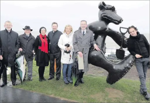  ??  ?? At the recent unveiling of the Beach Bear sculpture on Greystones Seafront were Brendan Hickey, Dermot and Helen Dwyer, Colum O'Broin, Marie McCooey and David O'Reilly of Greystones Tidy Towns and sculptor Patrick O'Reilly.