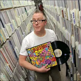  ?? Arkansas Democrat-Gazette/JOHN SYKES JR. ?? Reade Mitchell, manager of Arkansas Record-CD Exchange, says the store sells nearly as many compact discs as it does vinyl records.