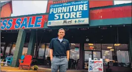  ?? ?? Third-generation furniture broker and owner of Richmond Home Furnishing­s Walter K
Jeczen says he is honored to follow in the footsteps of his successful grandfathe­r and father.