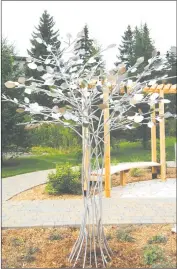  ?? COURTESY ?? Inside La Maison au Diapason’s new memorial park stands a stainless steel tree created by artist and sculptor, Mathieu Isabelle