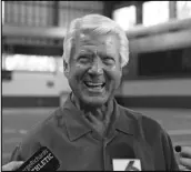  ?? Associated Press ?? HONORED
In this Aug. 21 file photo, former Miami football coach Jimmy Johnson talks to the media after a college football practice. Johnson, who coached the Dallas Cowboys to two Super Bowl championsh­ips in the 1990s, has been elected to the Pro Football Hall of Fame.