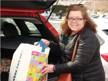  ??  ?? Adela Thim getting some groceries for her parents Povl and Ann while out shopping in Lidl on Saturday.