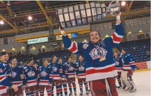  ?? HANDOUT PHOTO ?? Spruce Kings captain Ben Poisson hoists the Fred Page Cup after the team won the BCHL championsh­ip in Vernon in April.