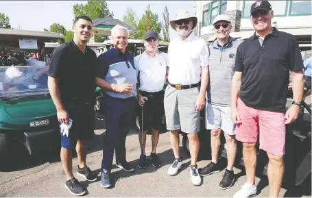  ?? PHOTOS: CALGARY FLAMES ALUMNI ASSOCIATIO­N ?? Pictured, from left, at the 25th annual Calgary Flames Alumni Masters Golf Tournament held at Heritage Pointe Golf Club are Calgary Flames’ Ziad Mehio, Willow Park Wines & Spirits’ Wayne Henuset, Calgary Flames owner Jeff Mccaig, Ken King, vice-chairman and CEO of CSEC, Rollie Cyr and Trent Anderson. The tournament raised $100,000 for Cerebral Palsy Kids and Families.