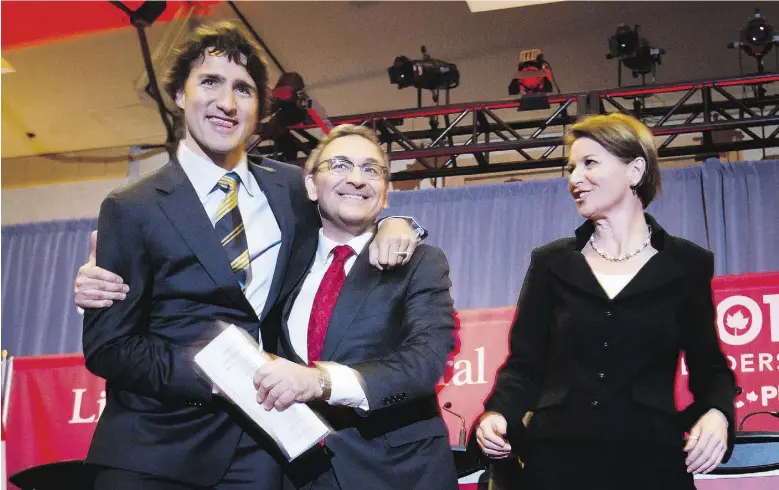  ?? Dar
yl Dyck / The Cana dian Press files ?? Justin Trudeau, left, and Martin Cauchon embrace as Martha Hall Findlay watches after the Liberal party’s first leadership debate in Vancouver in January 2013.