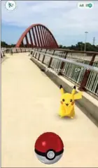  ??  ?? The Pokemon character Pikachu on the pedestrian bridge over the QEW.