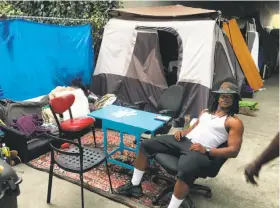  ?? Otis R. Taylor Jr. / The Chronicle ?? Vernon Pierce, 24, helps enforce community rules at an Oakland homeless camp that stands out for its well-organized tidiness.
