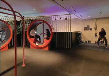  ??  ?? Adding on to the fun element, the gym on the second level not only has weights and TRX gear, but also a treadmill disguised as a life-sized hamster wheel