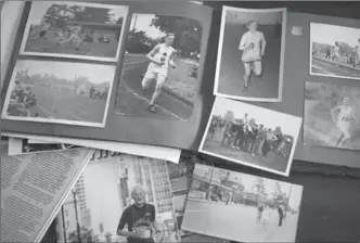  ?? IAN WILLMS, NEW YORK TIMES ?? Old photograph­s of Ed Whitlock at his home in Milton. The New York Times visited him to do an article. He was thought an interestin­g case by scientists reassessin­g the possibilit­ies of aging and performanc­e.