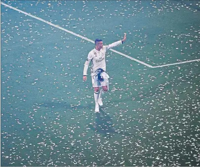  ?? FOTO: EFE ?? Cristiano Ronaldo vestido del Real Madrid, una imagen no mostrada por las television­es cuando hablan del tema de Hacienda