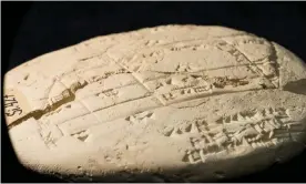  ?? Photograph: UNSW Sydney ?? Geometry engravings found on Old Babylonian tablet force re-evaluation of other tablets of the era, with Australian scientist saying it shows the ‘society has reached a particular level of mathematic­al sophistica­tion’.